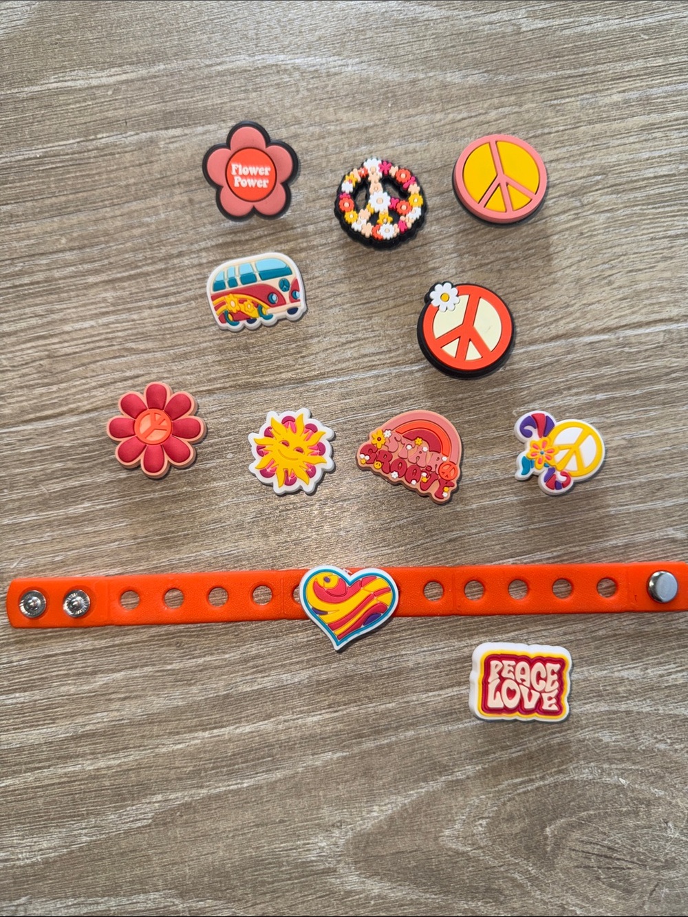 Kids Orange Snap Bracelet with Peace & Flower Charms